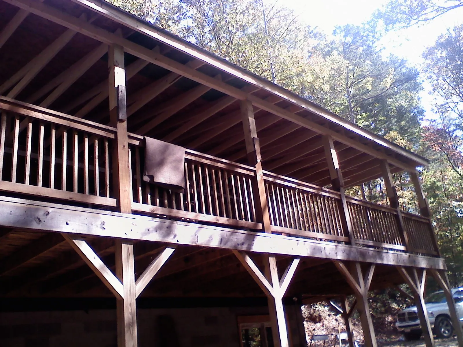 Timber framing under a new elevated porch and deck — Roof Leak Repair in New Middletown by Roofing Brothers